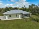 Single story house with screened patio and fenced yard at 4130 Rock Creek Dr, Port Charlotte, FL 33948