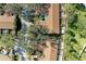 Aerial view of community featuring building rooftops, landscaping, and paved roads at 4417 Park Lake N Ter, Bradenton, FL 34209