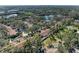 Aerial perspective of community near lake and school at 4417 Park Lake N Ter, Bradenton, FL 34209