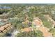 Aerial view of community, showing villas and a tennis court at 4417 Park Lake N Ter, Bradenton, FL 34209