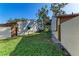 Landscaped backyard with grassy area between units at 4417 Park Lake N Ter, Bradenton, FL 34209