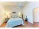 Spacious bedroom with hardwood floors and ceiling fan at 4417 Park Lake N Ter, Bradenton, FL 34209