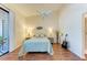 Cozy bedroom featuring a comfortable bed and hardwood floors at 4417 Park Lake N Ter, Bradenton, FL 34209