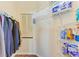 Large closet with shelving and hanging rods for storage at 4417 Park Lake N Ter, Bradenton, FL 34209