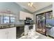 Kitchen features stainless steel appliances and a view of the patio at 4417 Park Lake N Ter, Bradenton, FL 34209