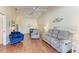 Spacious living room with comfy seating and ceiling fan at 4417 Park Lake N Ter, Bradenton, FL 34209