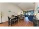 Open living room with view of the lanai and dining area at 4417 Park Lake N Ter, Bradenton, FL 34209
