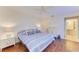 Main bedroom with king-size bed and en-suite bathroom at 4417 Park Lake N Ter, Bradenton, FL 34209
