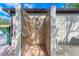 Outdoor shower facility with tiled walls and grab bars at 4417 Park Lake N Ter, Bradenton, FL 34209