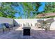 Private patio with seating area, fire pit, and umbrella at 4417 Park Lake N Ter, Bradenton, FL 34209