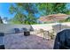 Spacious patio with dining area, fire pit, and grill at 4417 Park Lake N Ter, Bradenton, FL 34209