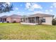 Home with a screened porch and spacious backyard at 5198 Layton Dr, Venice, FL 34293