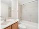 Bathroom features tub, shower, and vanity at 5198 Layton Dr, Venice, FL 34293