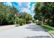 Gated community entrance with landscaping and flag at 5198 Layton Dr, Venice, FL 34293