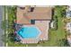 Aerial view of community pool and clubhouse at 5198 Layton Dr, Venice, FL 34293