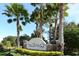 Ventura Village entrance sign with landscaping at 5198 Layton Dr, Venice, FL 34293