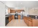 Modern kitchen featuring ample cabinetry and stainless steel appliances at 5198 Layton Dr, Venice, FL 34293