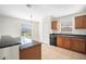 Bright kitchen with granite countertops and a breakfast bar at 5198 Layton Dr, Venice, FL 34293