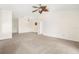 Living room with neutral color scheme and carpet flooring at 5198 Layton Dr, Venice, FL 34293