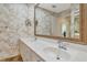 Elegant bathroom with dual sinks, white countertops, and floral wallpaper at 5856 Helicon Pl, Sarasota, FL 34238