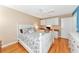 Bright bedroom with white furniture, built-in desk, and ample storage at 5856 Helicon Pl, Sarasota, FL 34238