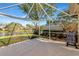 Large screened patio overlooking a serene lake at 5856 Helicon Pl, Sarasota, FL 34238