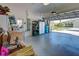 Spacious two car garage provides ample storage and exterior access at 589 Pond Willow Ln, Venice, FL 34292
