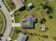 Aerial view of house and surrounding landscape at 6297 Drucker Cir, Port Charlotte, FL 33981
