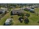 Aerial view showcasing home's backyard and landscape at 6297 Drucker Cir, Port Charlotte, FL 33981