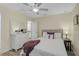 Bedroom with a full-size bed, dresser, and ceiling fan at 6297 Drucker Cir, Port Charlotte, FL 33981