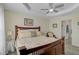 Bedroom with king-size bed and ensuite bathroom at 6297 Drucker Cir, Port Charlotte, FL 33981