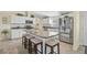 Modern kitchen featuring granite countertops and stainless steel appliances at 6297 Drucker Cir, Port Charlotte, FL 33981