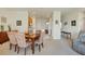 Dining area next to the kitchen with carpeted flooring at 6370 Falcon Lair Dr, North Port, FL 34287