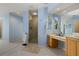 Elegant bathroom with walk-in shower and vanity at 811 The Esplanade N # 402, Venice, FL 34285