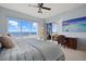 Serene bedroom with stunning ocean views and a built-in work space at 811 The Esplanade N # 402, Venice, FL 34285