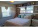 Guest bedroom with coastal decor and double bed at 858 S Green Cir # 506, Venice, FL 34285