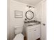 Small bathroom with white vanity and granite countertop at 1100 Capri Isles Blvd # 221, Venice, FL 34292