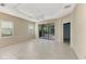 Spacious bedroom with sliding glass doors leading to a patio at 11539 Okaloosa Dr, Venice, FL 34293
