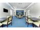 Community room with a TV and comfortable seating areas at 11539 Okaloosa Dr, Venice, FL 34293