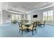 Community room with multiple tables and chairs, perfect for gatherings at 11539 Okaloosa Dr, Venice, FL 34293