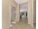 Open entryway with tile floors and French doors leading to another room at 11539 Okaloosa Dr, Venice, FL 34293