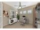 Home office with built-in shelving and window shutters at 11539 Okaloosa Dr, Venice, FL 34293