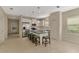 Modern kitchen with stainless steel appliances and an island at 11539 Okaloosa Dr, Venice, FL 34293