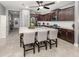 Modern kitchen with stainless steel appliances and large island at 1195 Collier Pl, Venice, FL 34293