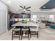 Modern kitchen with stainless steel appliances and large island at 1195 Collier Pl, Venice, FL 34293