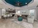 Spacious living area with teal ceiling and comfortable furniture at 1195 Collier Pl, Venice, FL 34293