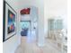 Bright dining room with elegant furnishings and views into the living area at 125 Amora Ave, Venice, FL 34285