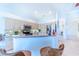 Modern kitchen with stainless steel appliances and a breakfast bar at 125 Amora Ave, Venice, FL 34285