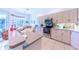 Modern kitchen with stainless steel appliances at 125 Amora Ave, Venice, FL 34285