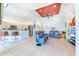 Living area with kitchen and breakfast nook views at 125 Amora Ave, Venice, FL 34285